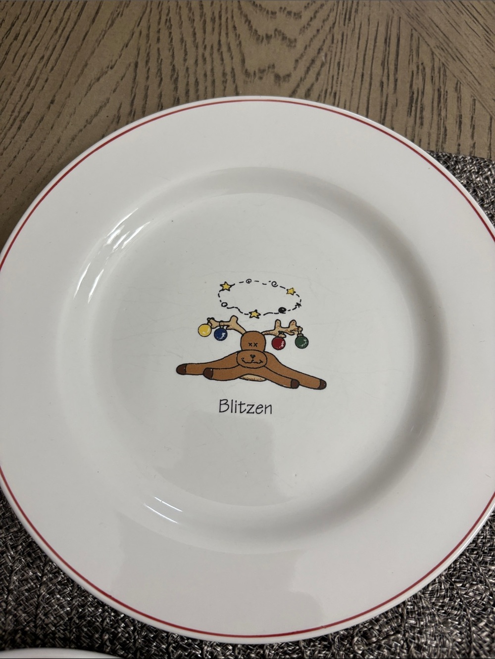 Rainbow White Dinner Plate with Red Trim and Reindeer Blitzen